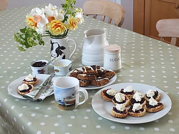 Photo Gallery Image - A delicious cream tea on arrival